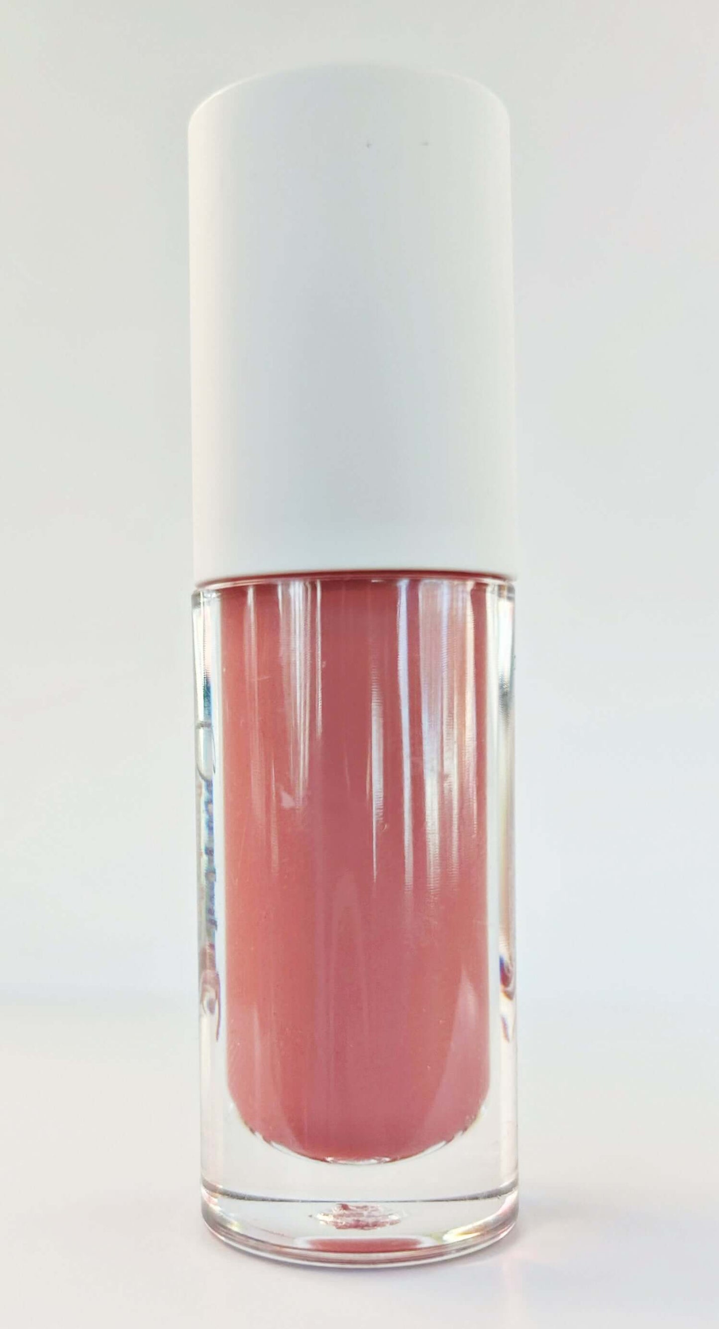 Pink nude pigmented lip gloss