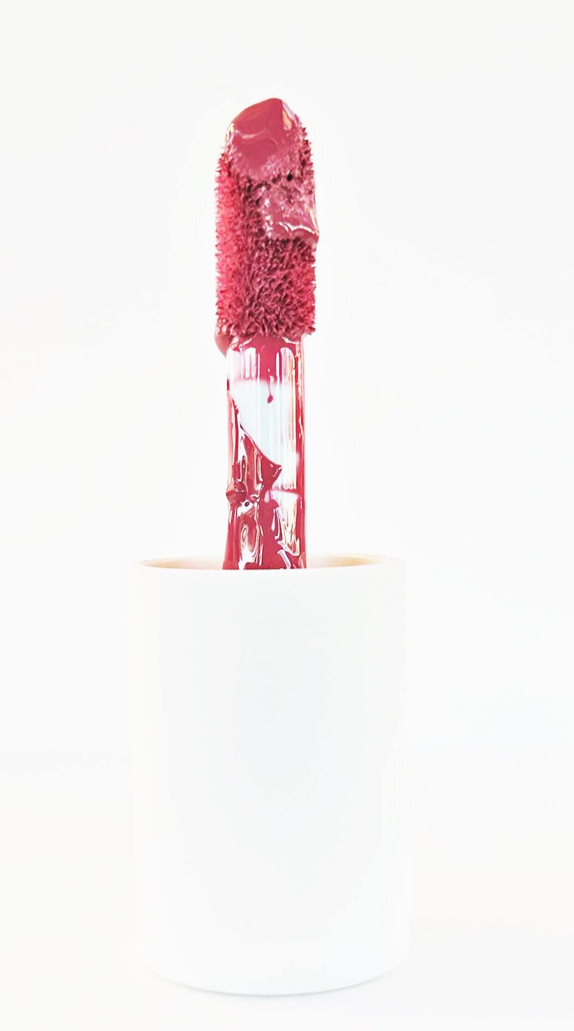 Pink nude pigmented lip gloss